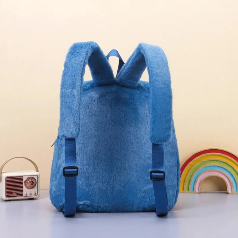 MOCHILA DE PELÚCIA  COM ESTAMPA DE DESENHO ANIMADO